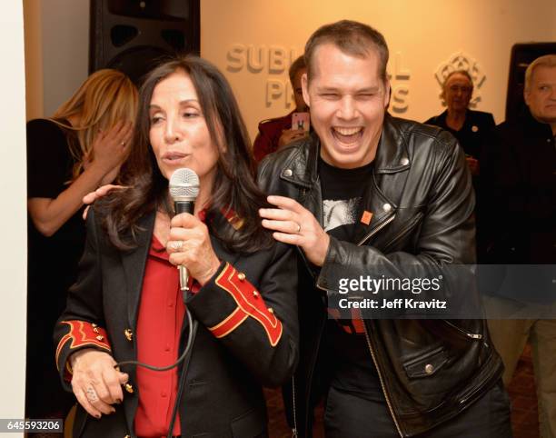 Author Olivia Harrison and artist Shepard Fairey attend the "I ME MINE" George Harrison book launch at Subliminal Projects Gallery on February 25,...