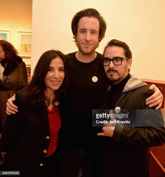 Author Olivia Harrison, music manager David Zonshine, and singer-songwriter Dhani Harrison attend the "I ME MINE" George Harrison book launch at...