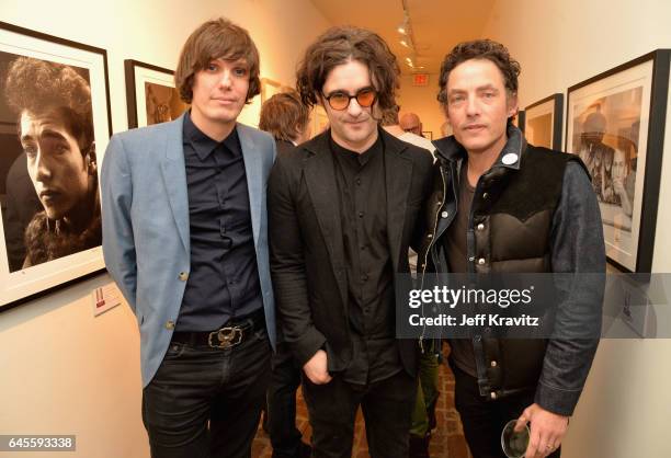 Musician Nikolai Fraiture of The Strokes, musician Robert Levon Been of Black Rebel Motorcyle Club attend the "I ME MINE" George Harrison book launch...