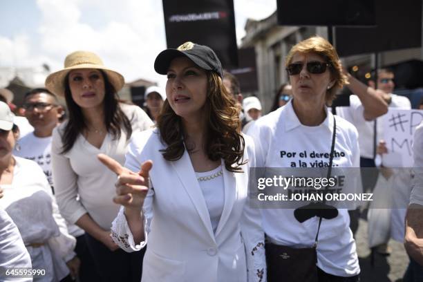 Zury Rios , daughter of former Guatemalan dictator , retired General Jose Efrain Rios, takes part take part in a protest in Guatemala City on...