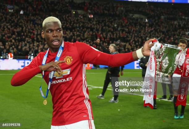 Paul Pogba of Manchester United celebrates after the EFL Cup Final match between Manchester United and Southampton at Wembley Stadium on February 26,...