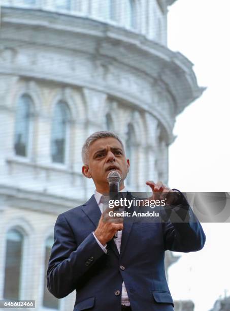 London Mayor Sadiq Khan addresses the crowd as thousands gather to watch a free screening and UK premier of Iranian film "The Salesman" in Trafalgar...