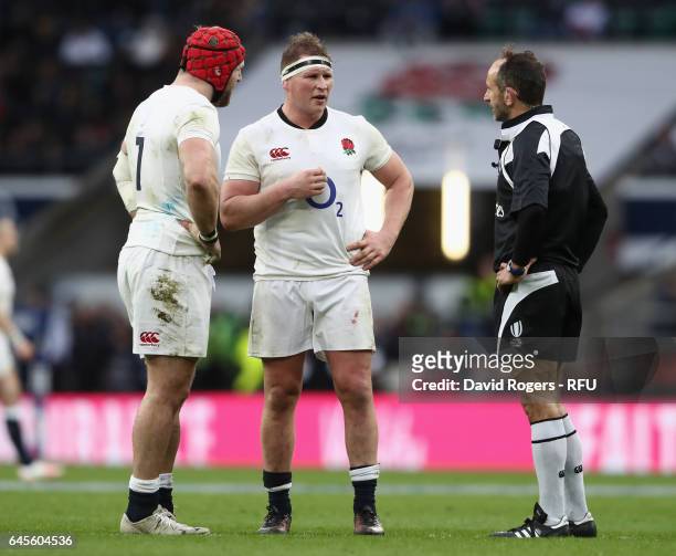 Dylan Hartley the England captain talks to referee Romain Poite as team mate James Haskell looks on during the RBS Six Nations match between England...