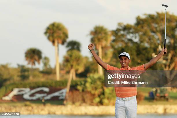 Rickie Fowler of the United States celebrates winning on the 18th green during the final round of The Honda Classic at PGA National Resort and Spa on...