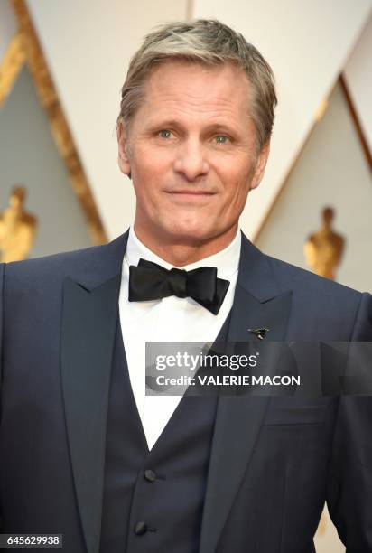 Nominee for Best Actor "Captain Fantastic" Viggo Mortensen arrives on the red carpet for the 89th Oscars on February 26, 2017 in Hollywood,...