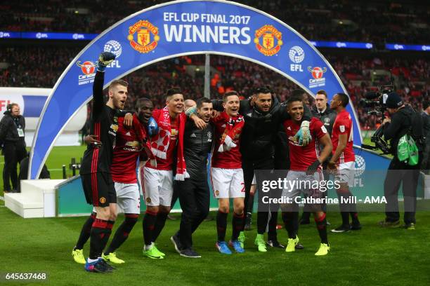 David de Gea, Eric Bailly, Marcos Rojo, Henrikh Mkhitaryan, Ander Herrera, Sergio Romero and Antonio Valencia of Manchester United celebrate during...