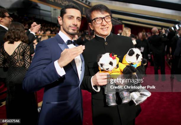 Actors Riz Ahmed and Jackie Chan attend the 89th Annual Academy Awards at Hollywood & Highland Center on February 26, 2017 in Hollywood, California.