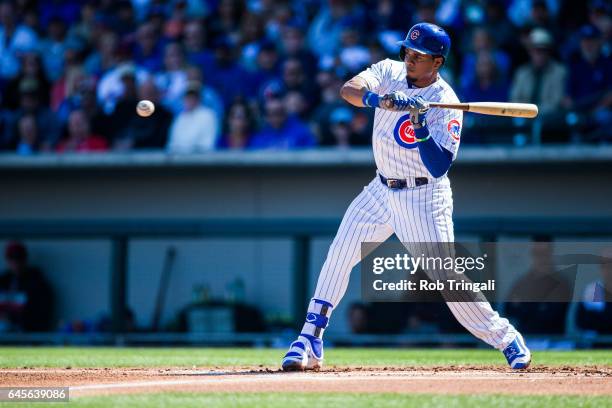 Carlos Corporan of the Chicago Cubs bats in the second inning during the spring training game against the Cleveland Indians during a spring training...