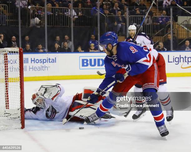Sergei Bobrovsky of the Columbus Blue Jackets blocks the net against Mika Zibanejad of the New York Rangers at Madison Square Garden on February 26,...