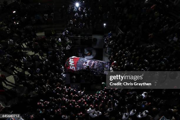 Kurt Busch, driver of the Haas Automation/Monster Energy Ford, celebrates in Victory Lane after winning the 59th Annual DAYTONA 500 at Daytona...