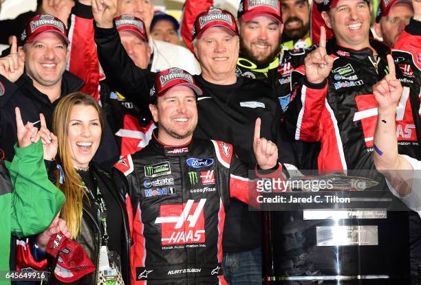 Kurt Busch, driver of the Haas Automation/Monster Energy Ford, celebrates in Victory Lane after winning the 59th Annual DAYTONA 500 at Daytona...