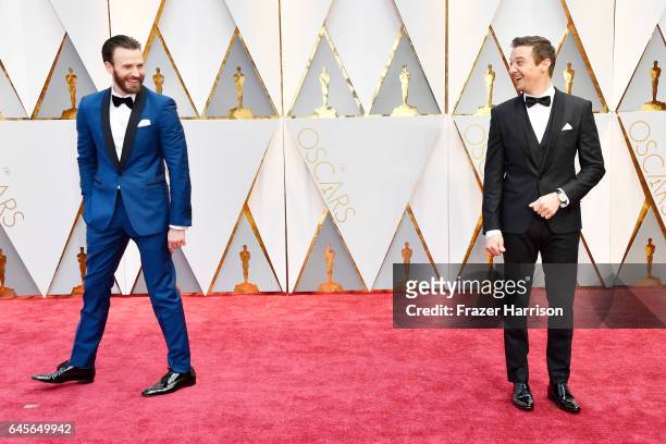 Actors Chris Evans and Jeremy Renner attend the 89th Annual Academy Awards at Hollywood & Highland Center on February 26, 2017 in Hollywood,...