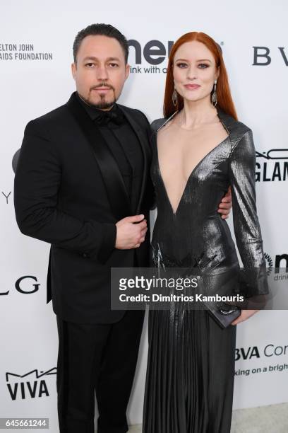 Producer Klemens Hallmann and Barbara Meier attend the 25th Annual Elton John AIDS Foundation's Academy Awards Viewing Party at The City of West...
