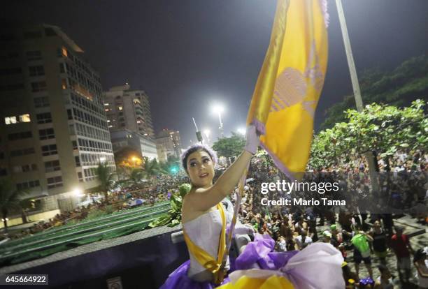 Revelers attend the Simpatia e Quase Amor 'bloco', or street party, on the third official day of Carnival along Ipanema beach on February 26, 2017 in...