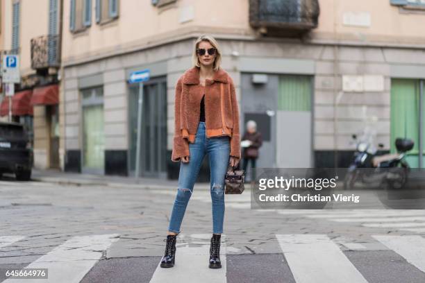 Lisa Hahnbueck wearing Designers Remix Candy Coat Boxy Shearling Coat with large collar and zipper, Citizens of Humanity jeans, OF HUMANITY JEANS,...