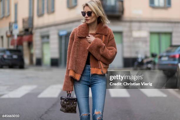 Lisa Hahnbueck wearing Designers Remix Candy Coat Boxy Shearling Coat with large collar and zipper, Citizens of Humanity jeans, OF HUMANITY JEANS,...