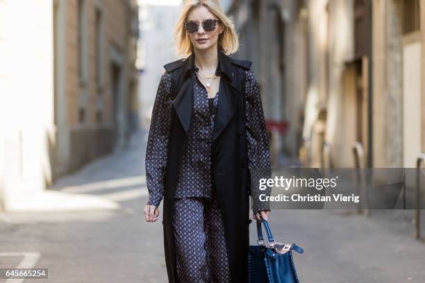 Lisa Hahnbueck wearing Designers Remix Pyjama Shirt and Pyjama Pants, Victoria Beckham Sleeveless Satin Coat, MSGM Fake Fur Vest, Fendi Peekaboo bag,...