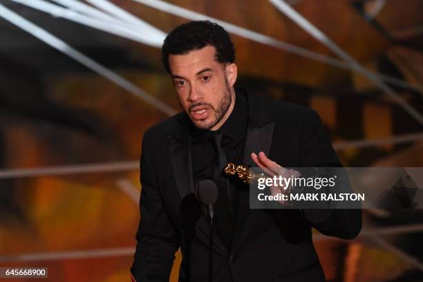 Director Ezra Edelman delivers a speech on stage after he won the Best Documentary Feature award for "O.J. Made In America" at the 89th Oscars on...