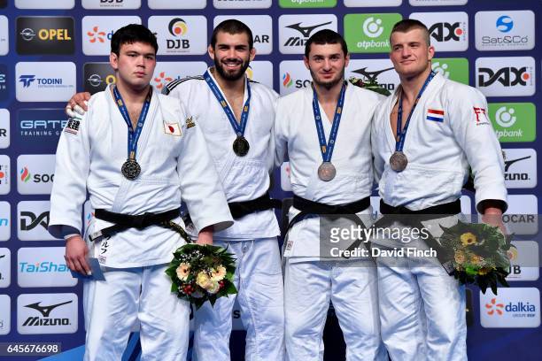 Under 100kg medallists L-R: Silver; Aaron Wolf of Japan, Gold; Toma Nikiforov of Belgium, Bronzes; Michael Korrel of the Netherlands and Kazbek...