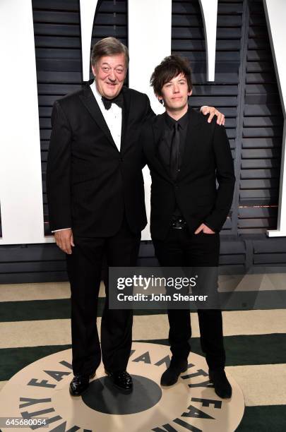 Actor Stephen Fry and comedien Elliott Spencer attend the 2017 Vanity Fair Oscar Party hosted by Graydon Carter at Wallis Annenberg Center for the...