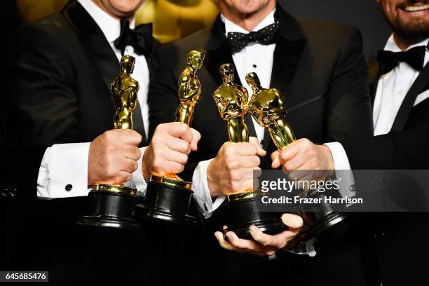 Sound mixers Peter Grace, Robert Mackenzie, Kevin O'Connell and Andy Wright, winners of the Best Sound Mixing award for 'Hacksaw Ridge' pose in the...