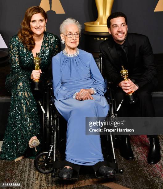 Mathematician Katherine Johnson and director Ezra Edelman and producer Caroline Waterlow , winners of Best Documentary Feature for 'O.J.: Made in...