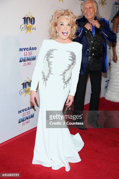 Musician Tanya Tucker and designer Peter Nygard attend The 27th Annual Night Of 100 Stars Black Tie Dinner Viewing Gala at the Beverly Hilton Hotel...