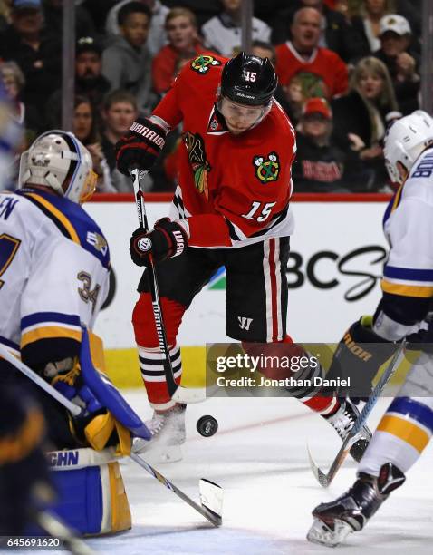 Artem Anisimov of the Chicago Blackhawks shoots and scores a third period goal against Jake Allen of the St. Louis Blues at the United Center on...