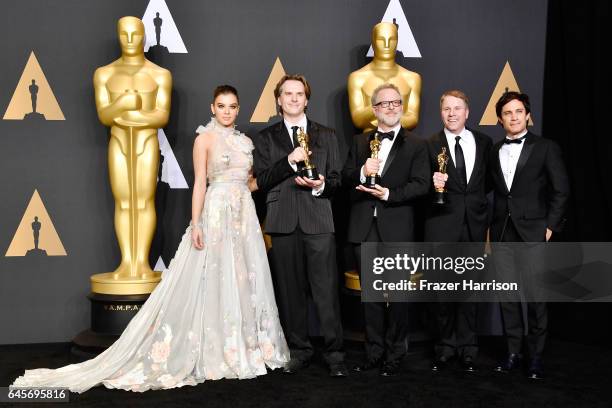 Actor Hailee Steinfeld, co-directors Byron Howard and Rich Moore and producer Clark Spencer, winners of the Best Animated Feature Film award for...