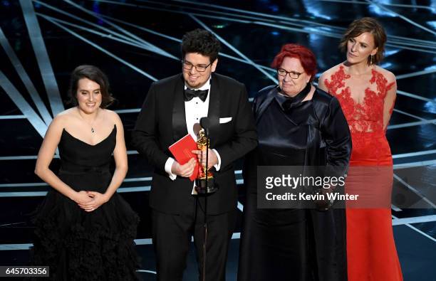 Director Kristof Deak and producer Anna Udvardy accept Best Live Action Short Film for 'Sing' onstage during the 89th Annual Academy Awards at...