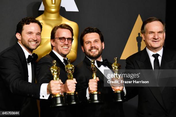 Visual effects artists Dan Lemmon, Andrew R. Jones, Adam Valdez and Robert Legato, winners of Best Visual Effects for 'The Jungle Book' pose in the...