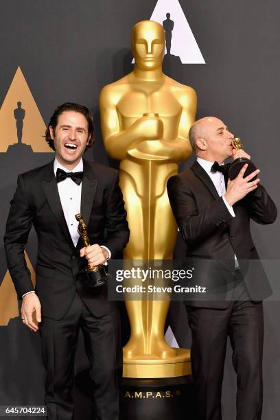 Director Alan Barillaro and producer Marc Sondheimer, winners of the award for Short Film for 'Piper,' pose in the press room during the 89th Annual...