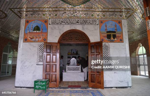 This photograph taken on February 15, 2017 shows Amir Sajjad , brother of Mumtaz Qadri, who was hanged last year for the murder of a governor who...