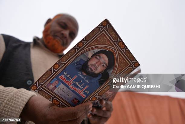 This photograph taken on February 15, 2017 shows an uncle of Mumtaz Qadri, who was hanged last year for the murder of a governor who criticized...