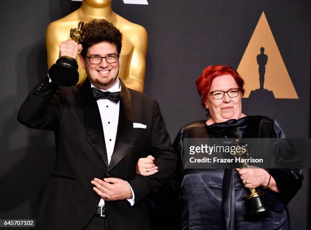 Director Kristof Deak and producer Anna Udvardy, winners of Best Live Action Short Film for 'Sing' pose in the press room during the 89th Annual...