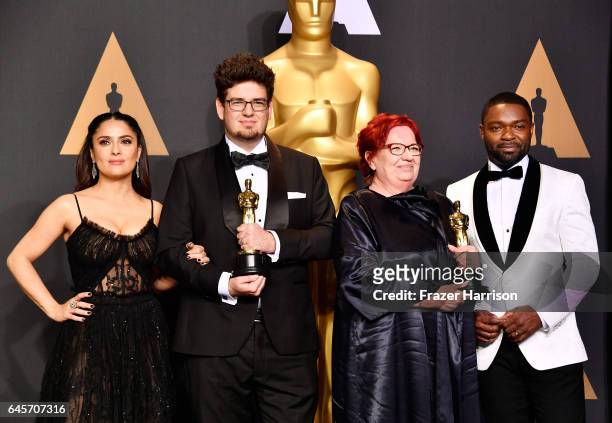 Actor Salma Hayek, director Kristof Deak and producer Anna Udvardy, winners of Best Live Action Short Film for 'Sing' and actor David Oyelowo pose in...