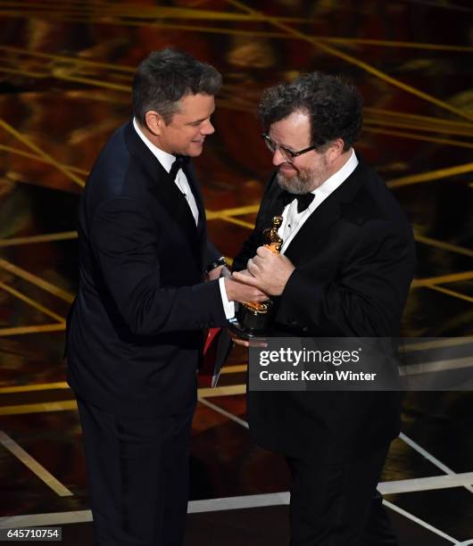 Writer/director Kenneth Lonergan accepts Best Original Screenplay for 'Manchester by the Sea' from actor/producer Matt Damon onstage during the 89th...