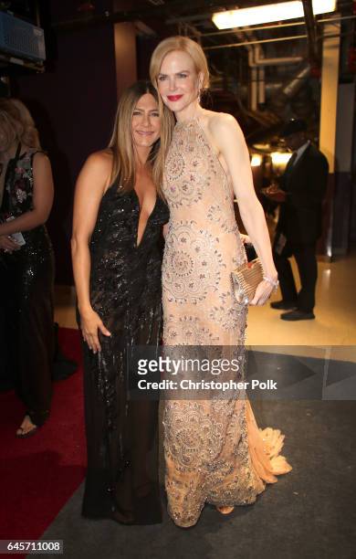 Actors Jennifer Aniston and Nicole Kidman pose backstage during the 89th Annual Academy Awards at Hollywood & Highland Center on February 26, 2017 in...