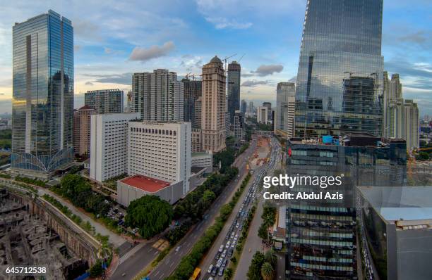 jakarta afternoon skyline at sudirman street - sudirman stock pictures, royalty-free photos & images