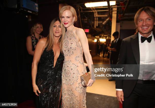 Actors Jennifer Aniston and Nicole Kidman pose backstage during the 89th Annual Academy Awards at Hollywood & Highland Center on February 26, 2017 in...