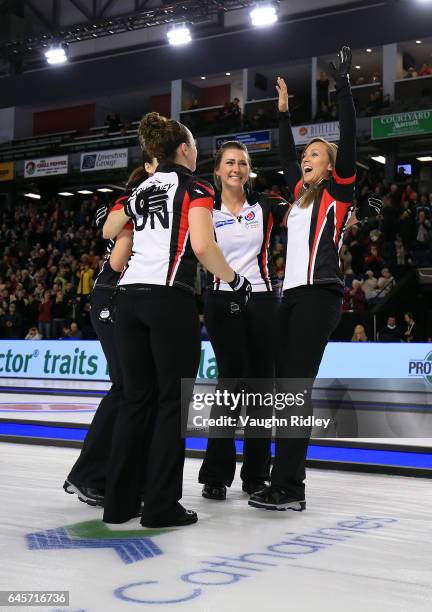 Lisa Weagle, Joanne Courtney, Emma Miskew and Rachel Homan of Ontario celebrate victory in the Gold Medal match against Manitoba during the 2017...