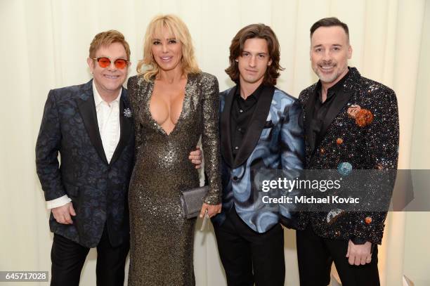 Host Elton John, Diana Jenkins, Asher Monroe, and host David Furnish attend the 25th Annual Elton John AIDS Foundation's Oscar Viewing Party at The...