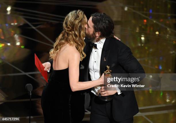 Actor Casey Affleck accepts Best Actor for 'Manchester by the Sea' from actor Brie Larson onstage during the 89th Annual Academy Awards at Hollywood...