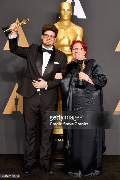 Director Kristof Deak and producer Anna Udvardy, winners of the award for Short Film for 'Sing,' pose in the press room during the 89th Annual...