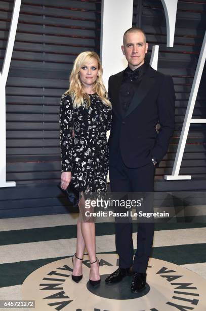 Actor Reese Witherspoon and Jim Toth attend the 2017 Vanity Fair Oscar Party hosted by Graydon Carter at Wallis Annenberg Center for the Performing...