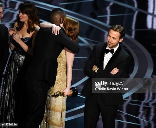 Moonlight' actor Mahershala Ali hugs Emma Stone after it was discovered 'La La Land' was mistakenly announced as Best Picture onstage during the 89th...