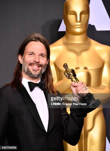 Cinematographer Linus Sandgren, winner of the Best Cinematography award for 'La La Land' poses in the press room during the 89th Annual Academy...
