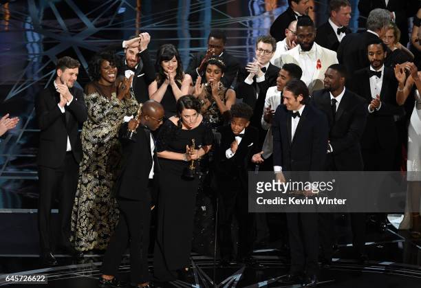 Cast and crew of 'Moonlight' accept the Best Picture award onstage during the 89th Annual Academy Awards at Hollywood & Highland Center on February...