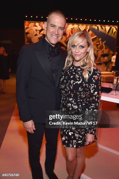 Jim Toth and Actor Reese Witherspoon attend the 2017 Vanity Fair Oscar Party hosted by Graydon Carter at Wallis Annenberg Center for the Performing...