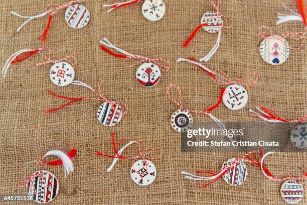 little march ("martisoare") talismans - martisor stock pictures, royalty-free photos & images